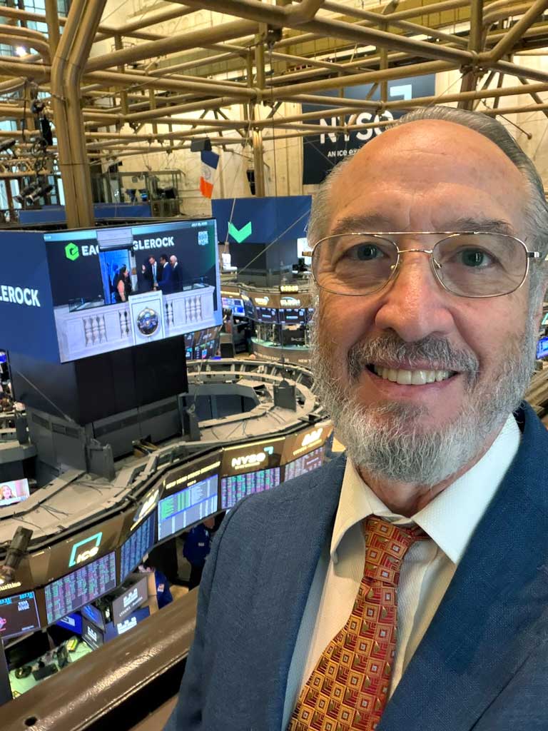 Frederick Ravid takes a selfie overlooking the trading floor of the New York Stock Exchange.